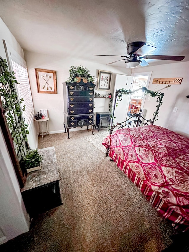 37969 Rd 422, Oakhurst, CA 93644 - carpeted bedroom featuring a ceiling fan and baseboards
