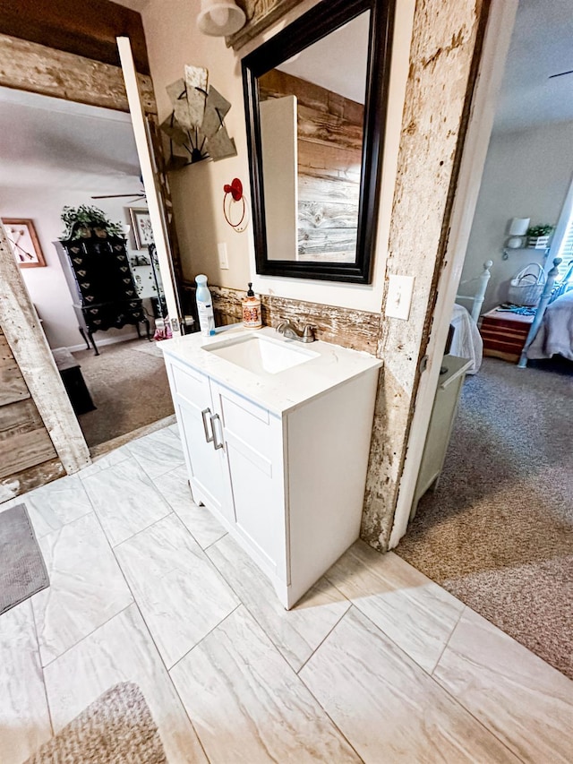 37969 Rd 422, Oakhurst, CA 93644 - bathroom featuring ensuite bath, vanity, and marble look tile flooring