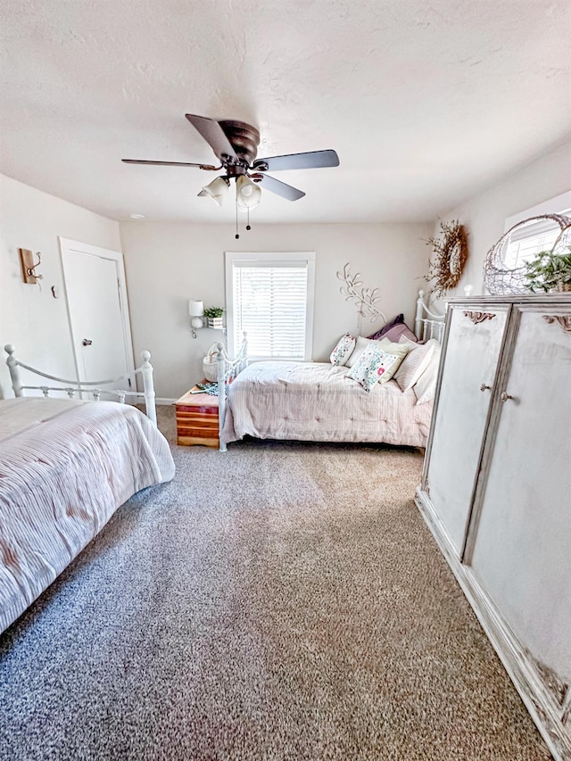 37969 Rd 422, Oakhurst, CA 93644 - carpeted bedroom featuring ceiling fan and baseboards
