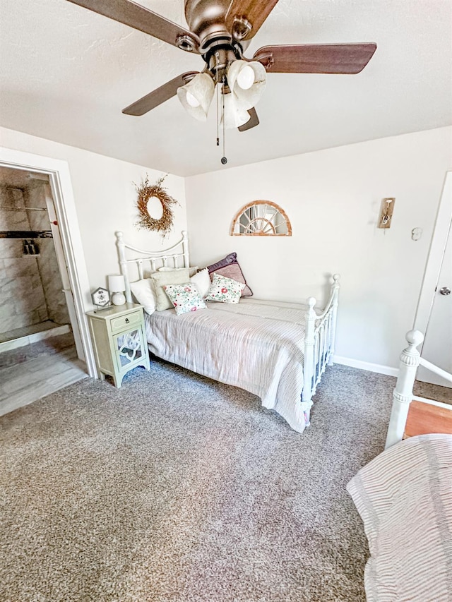 37969 Rd 422, Oakhurst, CA 93644 - carpeted bedroom with ensuite bath and a ceiling fan