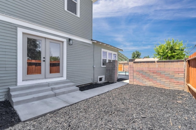 2643 B St, Selma, CA 93662 - view of home's exterior featuring entry steps, a fenced backyard, and french doors