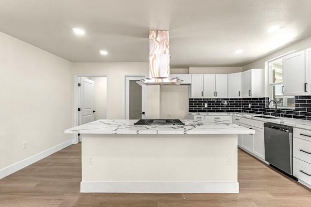 2643 B St, Selma, CA 93662 - kitchen featuring dishwasher, tasteful backsplash, a kitchen island, white cabinets, and recessed lighting