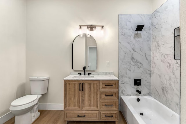 2643 B St, Selma, CA 93662 - bathroom featuring vanity, wood finished floors, and bathtub / shower combination