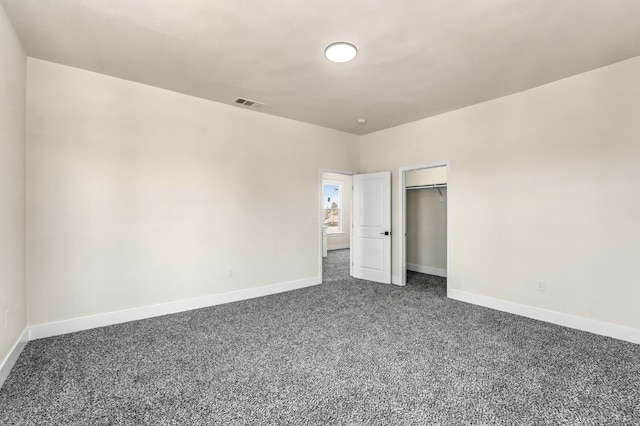 2643 B St, Selma, CA 93662 - unfurnished bedroom featuring dark colored carpet and a closet