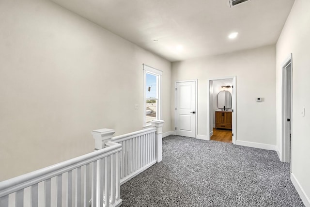2643 B St, Selma, CA 93662 - hallway with carpet flooring, an upstairs landing, and recessed lighting