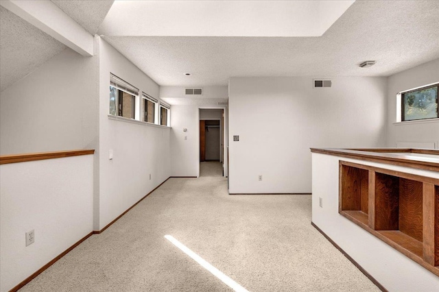 835 E Ashcroft Ave, Fresno, CA 93704 - carpeted spare room with a textured ceiling and plenty of natural light
