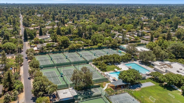 835 E Ashcroft Ave, Fresno, CA 93704 - bird's eye view of a pool and a heavily wooded area