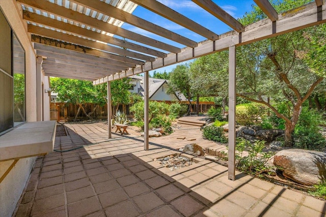 835 E Ashcroft Ave, Fresno, CA 93704 - fenced backyard with a patio and a pergola