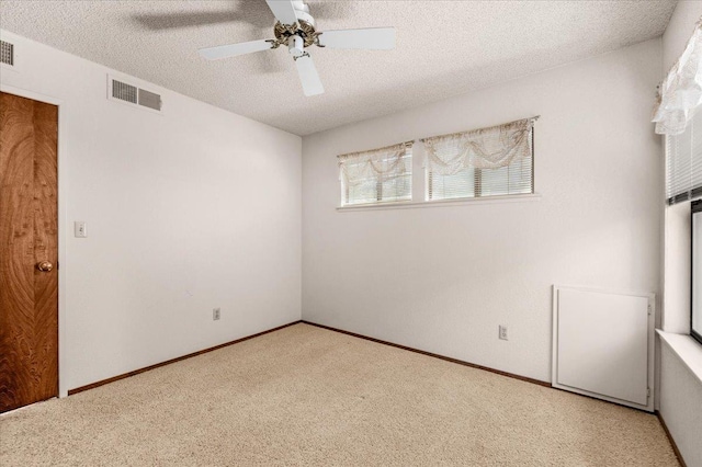 835 E Ashcroft Ave, Fresno, CA 93704 - spare room with carpet, a textured ceiling, and ceiling fan