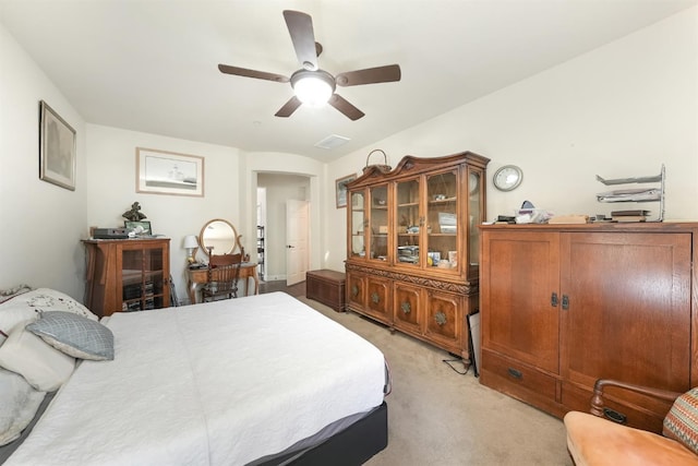 11319 N Via Napoli Dr, Fresno, CA 93730 - bedroom featuring light carpet and ceiling fan