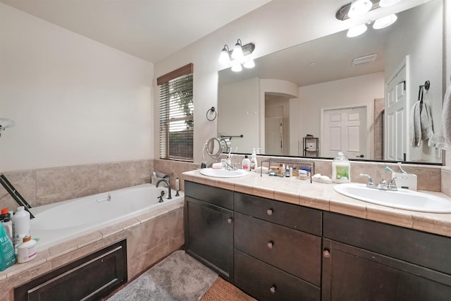 11319 N Via Napoli Dr, Fresno, CA 93730 - full bath featuring double vanity and a garden tub