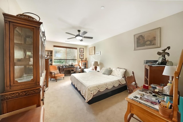 11319 N Via Napoli Dr, Fresno, CA 93730 - bedroom featuring light carpet, an office area, and ceiling fan