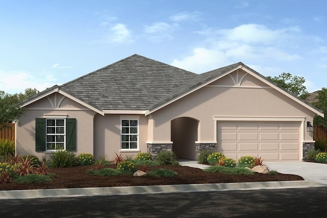 4553 Griffith Ave, Clovis, CA 93619 - single story home featuring driveway, stucco siding, an attached garage, and stone siding