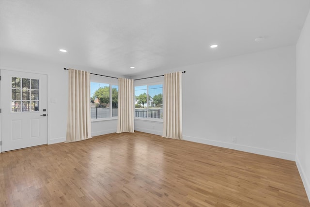 4596 E Huntington Ave, Fresno, CA 93702 - spare room featuring light wood-style flooring and recessed lighting