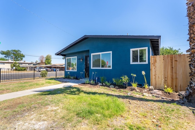 4596 E Huntington Ave, Fresno, CA 93702 - view of front of house with stucco siding