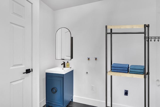 4596 E Huntington Ave, Fresno, CA 93702 - bathroom with baseboards and vanity