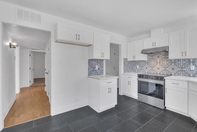 4596 E Huntington Ave, Fresno, CA 93702 - kitchen featuring electric range, under cabinet range hood, light countertops, and white cabinetry