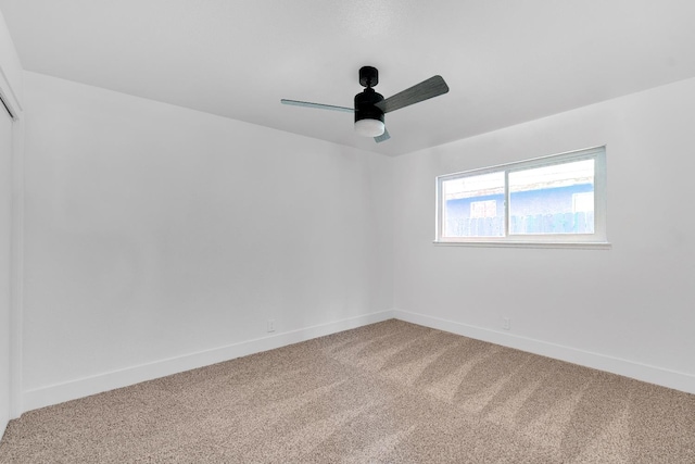 4596 E Huntington Ave, Fresno, CA 93702 - empty room featuring light carpet and a ceiling fan