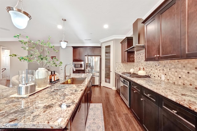 11617 N Bella Verde Ave, Fresno, CA 93730 - kitchen with appliances with stainless steel finishes, ornamental molding, wall chimney exhaust hood, a spacious island, and dark wood-style floors