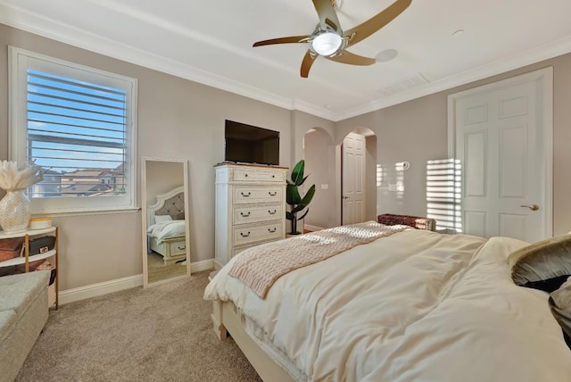 11617 N Bella Verde Ave, Fresno, CA 93730 - bedroom with arched walkways, light carpet, crown molding, and a ceiling fan