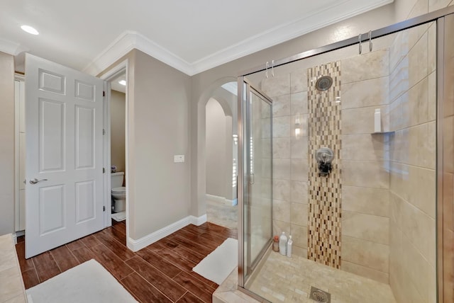 11617 N Bella Verde Ave, Fresno, CA 93730 - full bathroom with a stall shower, wood finish floors, ornamental molding, and recessed lighting