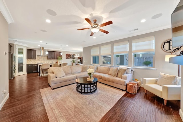 11617 N Bella Verde Ave, Fresno, CA 93730 - living room with ornamental molding, recessed lighting, a ceiling fan, and dark wood-style floors