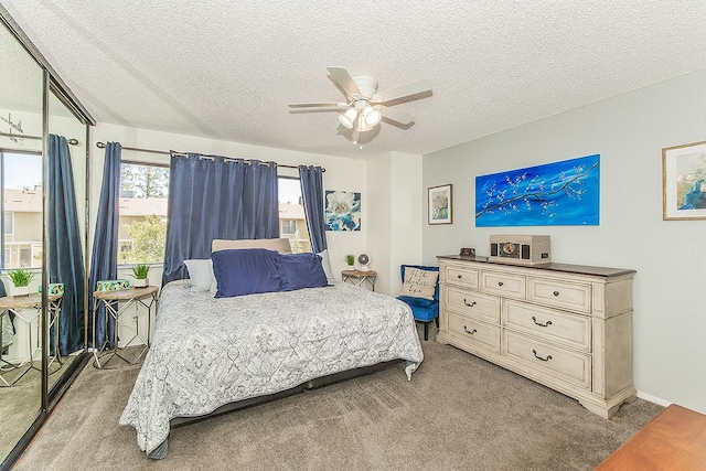 4885 N Backer Ave Unit 113, Fresno, CA 93726 - bedroom with light carpet, a textured ceiling, and ceiling fan
