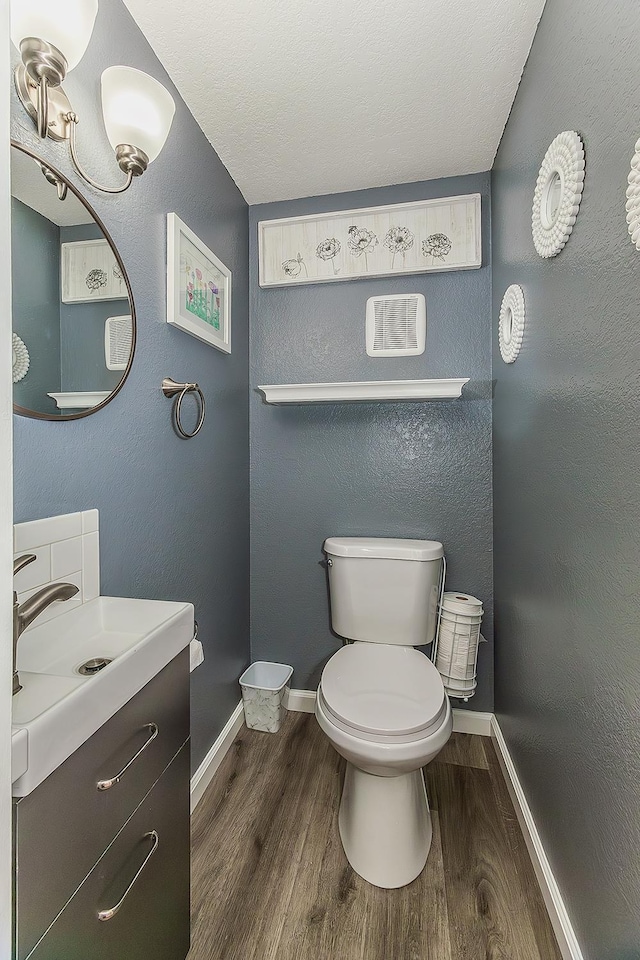 4885 N Backer Ave Unit 113, Fresno, CA 93726 - bathroom with wood finished floors and vanity