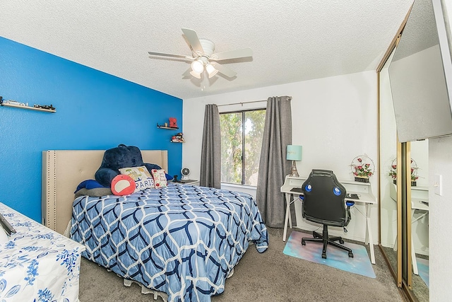 4885 N Backer Ave Unit 113, Fresno, CA 93726 - bedroom featuring carpet floors, a textured ceiling, ceiling fan, and an office area
