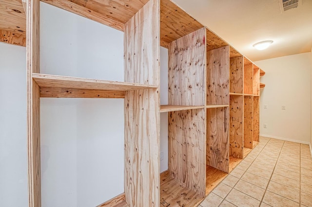 545 W Fedora Ave, Fresno, CA 93705 - walk in closet featuring tile patterned flooring