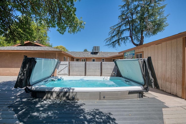545 W Fedora Ave, Fresno, CA 93705 - view of swimming pool with a covered hot tub and a deck