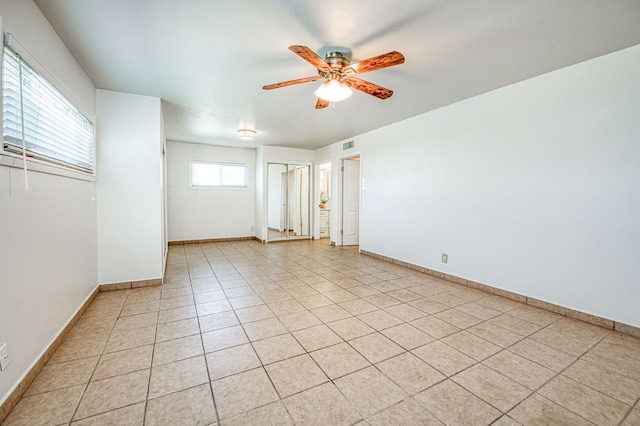 545 W Fedora Ave, Fresno, CA 93705 - spare room featuring ceiling fan and light tile patterned floors