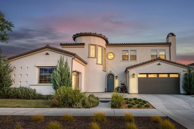 924 Orchard Hills Rd, Madera, CA 93636 - mediterranean / spanish-style home with driveway, stucco siding, a garage, and a tile roof