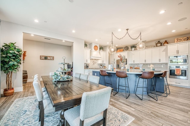 924 Orchard Hills Rd, Madera, CA 93636 - dining area with light wood-style flooring and recessed lighting