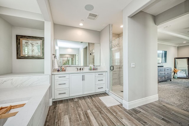 924 Orchard Hills Rd, Madera, CA 93636 - full bath with vanity, a shower stall, wood finished floors, and recessed lighting