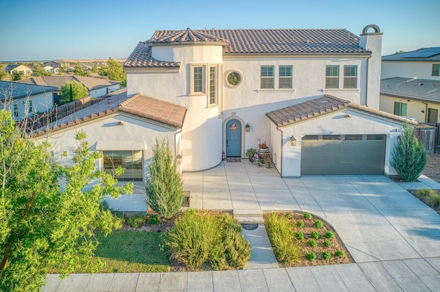 924 Orchard Hills Rd, Madera, CA 93636 - mediterranean / spanish house with driveway, stucco siding, and a tiled roof