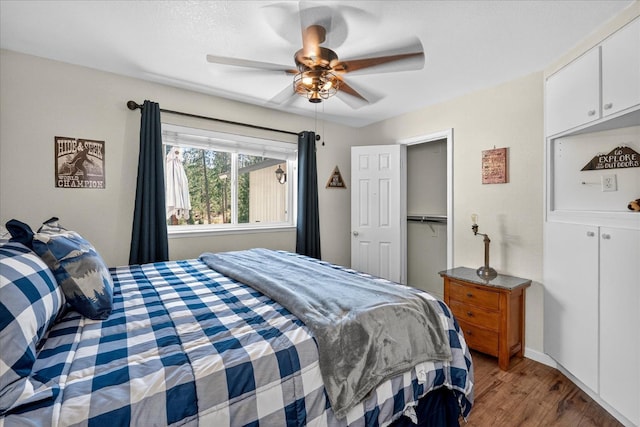 53401 Timberview Rd, North Fork, CA 93643 - bedroom featuring wood finished floors and a ceiling fan
