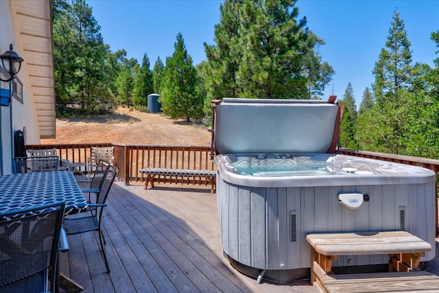 53401 Timberview Rd, North Fork, CA 93643 - deck featuring a hot tub and outdoor dining area