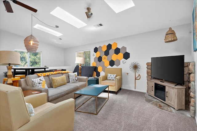 53401 Timberview Rd, North Fork, CA 93643 - living area featuring carpet flooring, a skylight, lofted ceiling, and a ceiling fan