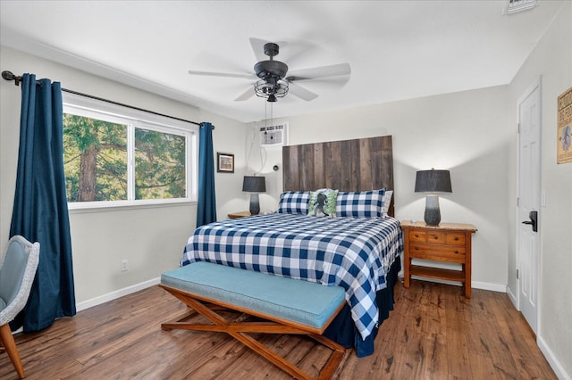 53401 Timberview Rd, North Fork, CA 93643 - bedroom with wood finished floors, ceiling fan, and a wall unit AC