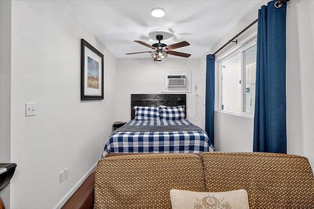 53401 Timberview Rd, North Fork, CA 93643 - bedroom featuring a wall mounted air conditioner, ceiling fan, and wood finished floors