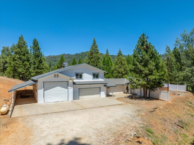 53401 Timberview Rd, North Fork, CA 93643 - view of front of home featuring driveway and a wooded view