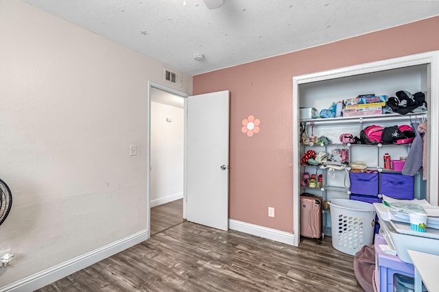 4679 E Pitt Ave, Fresno, CA 93725 - bedroom with wood finished floors and ceiling fan
