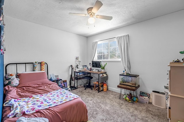 4679 E Pitt Ave, Fresno, CA 93725 - carpeted bedroom featuring a textured ceiling and a ceiling fan