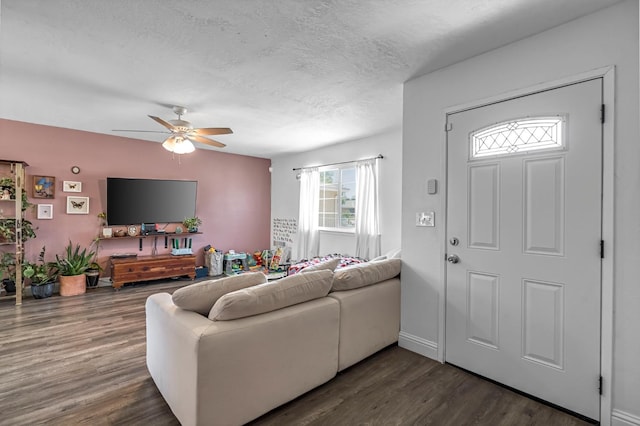 4679 E Pitt Ave, Fresno, CA 93725 - living room featuring ceiling fan, wood finished floors, and a textured ceiling