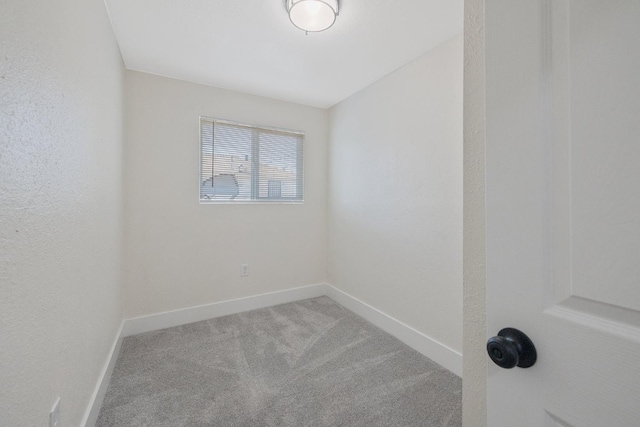 221 N Orchard St, Fresno, CA 93701 - carpeted empty room with baseboards