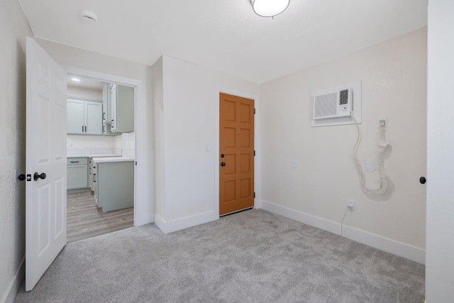 221 N Orchard St, Fresno, CA 93701 - unfurnished bedroom with light colored carpet and a wall unit AC