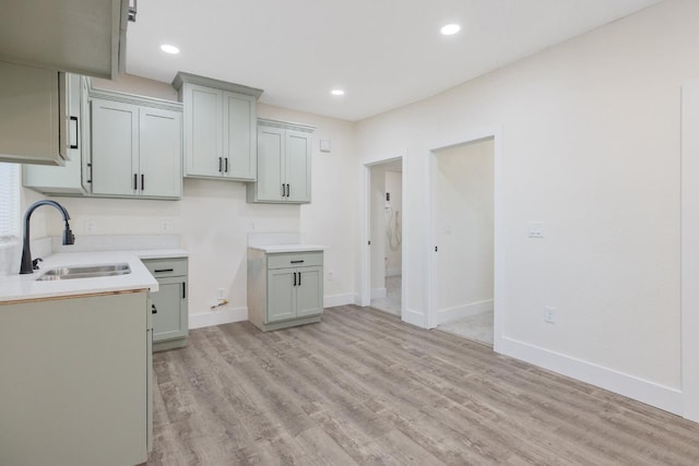 221 N Orchard St, Fresno, CA 93701 - kitchen featuring light wood-style flooring, light countertops, and recessed lighting