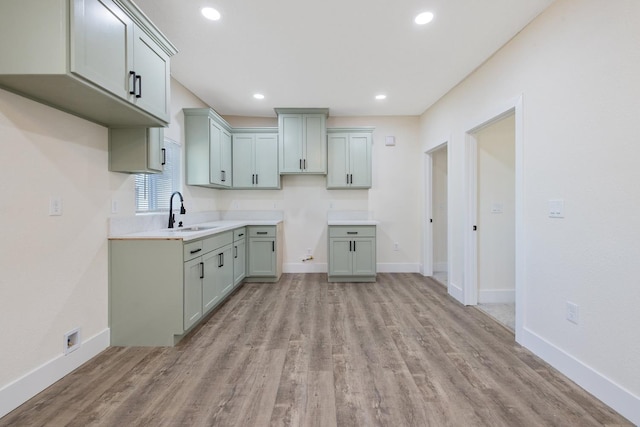 221 N Orchard St, Fresno, CA 93701 - kitchen featuring light wood finished floors, recessed lighting, and light countertops