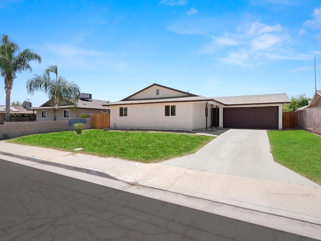 2557 Jackson St, Selma, CA 93662 - single story home with driveway, a garage, and stucco siding
